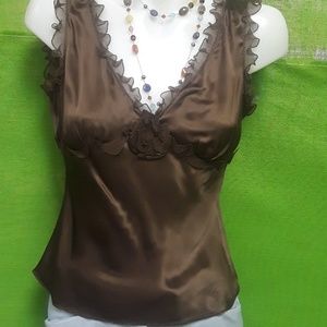 Sleeveless ruffle silk shirt